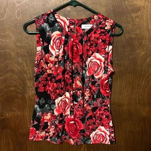 Calvin Klein sleeveless top.floral print size small.
